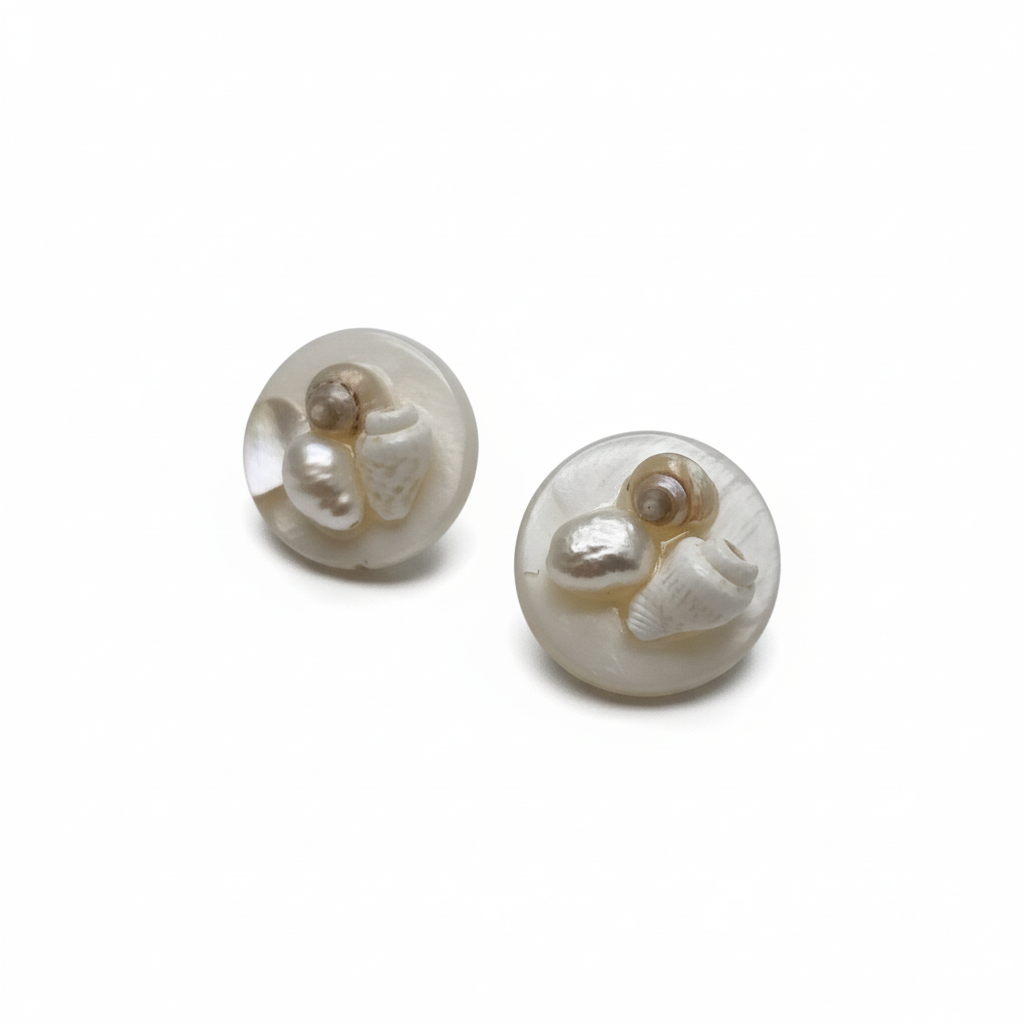 Pair of pearl earrings on a white background