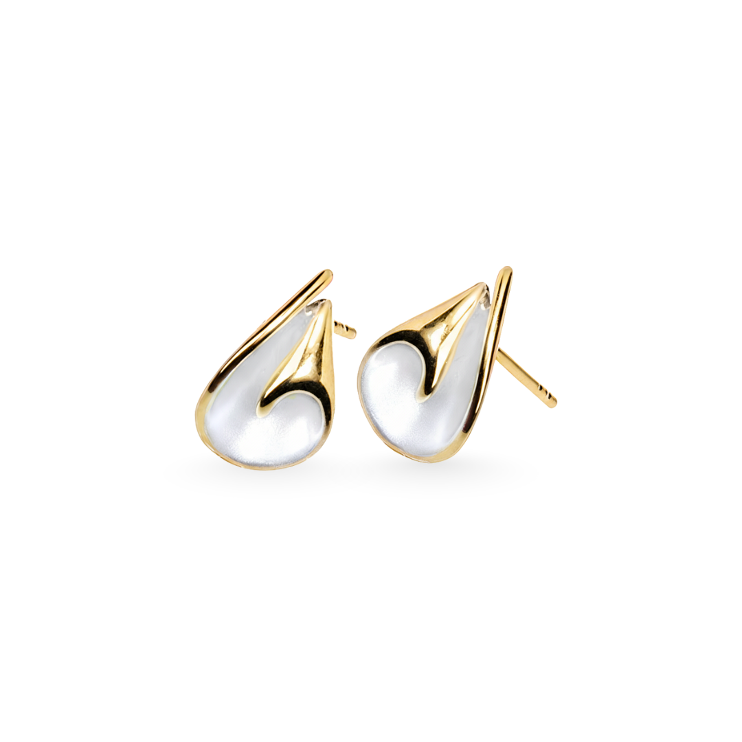 Gold and white earrings on a white background