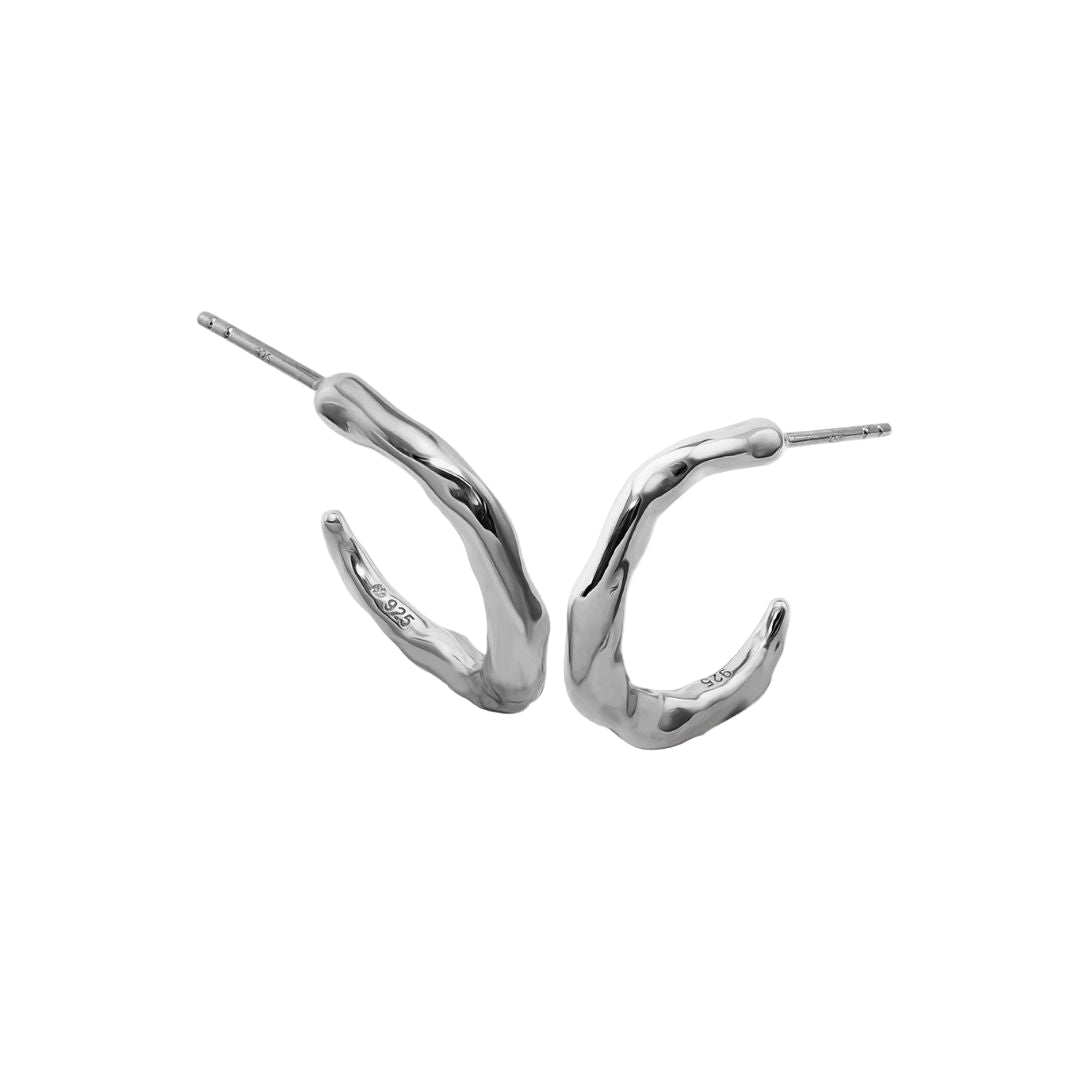 Pair of silver hoop earrings on a white background