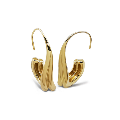 Gold hoop earrings on a white background