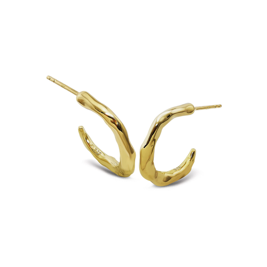 Gold hoop earrings on a white background