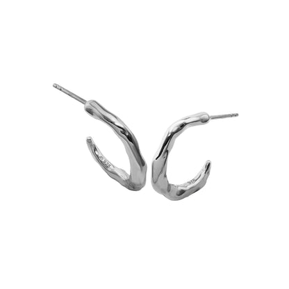Pair of silver hoop earrings on a white background