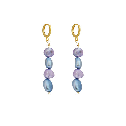 Pair of earrings with purple and blue beads on a white background