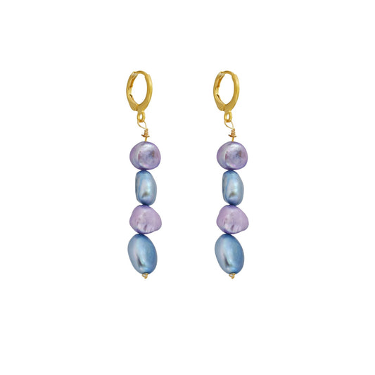Pair of earrings with purple and blue beads on a white background