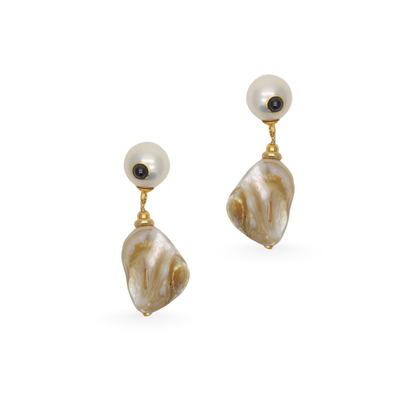 Pair of pearl earrings with gold accents on a white background