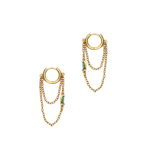 Gold hoop earrings with chains and green gemstones on a white background